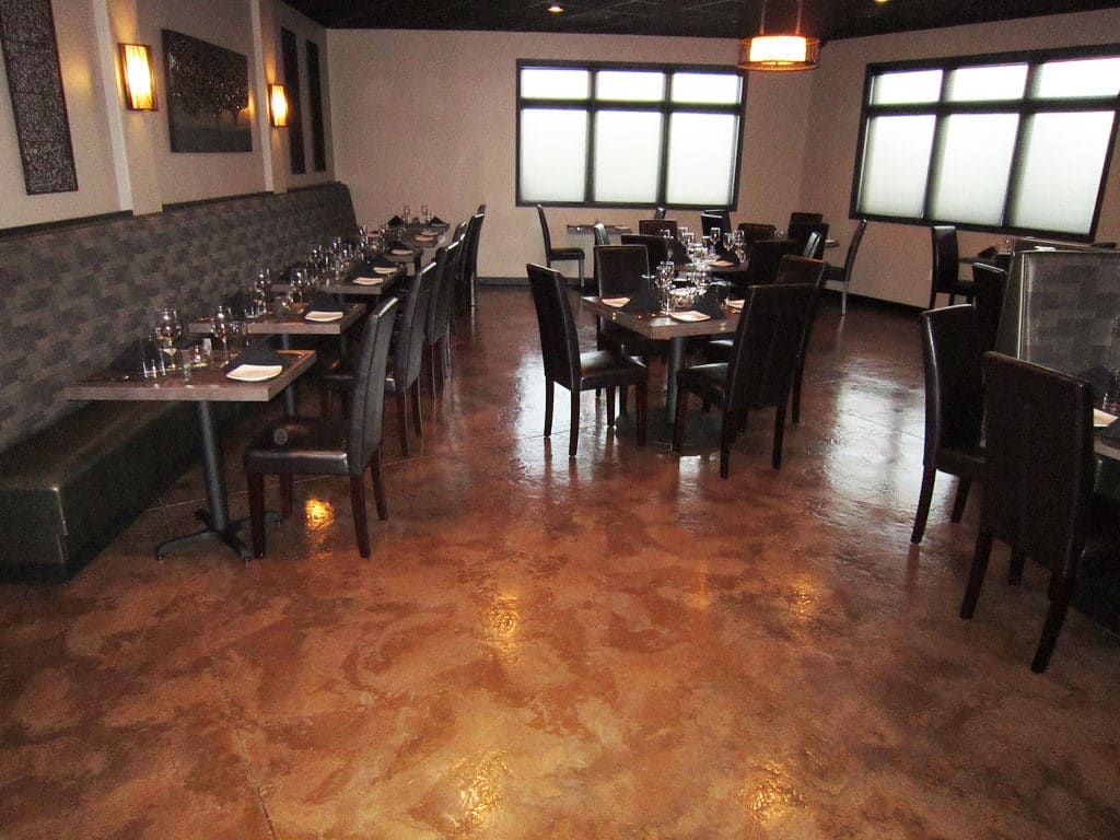 restaurant with newly installed flooring and empty chairs