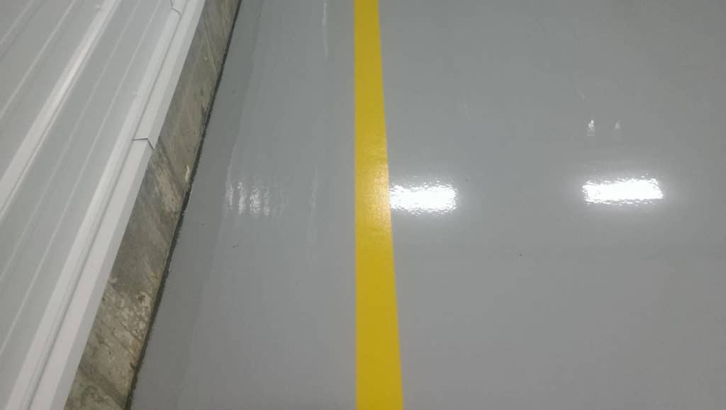 striped epoxy floors for inside a commercial garage